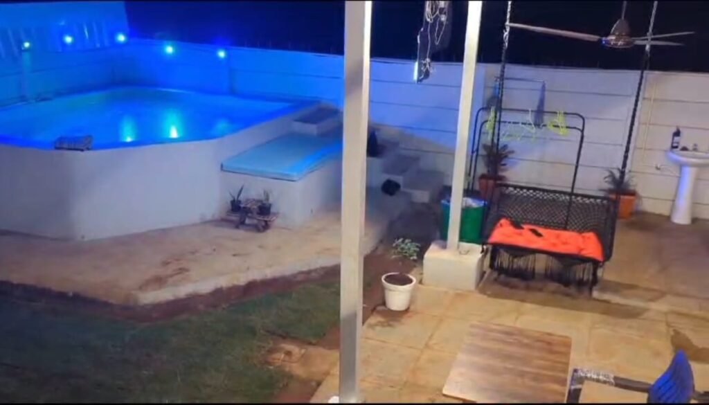 A woodland cabin featuring a splash pool